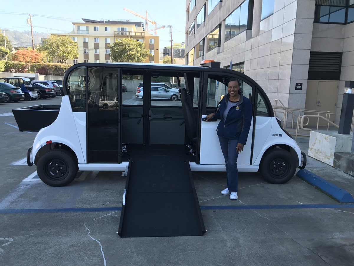 Image of Alesia Woods and new campus wheelchair accessible van